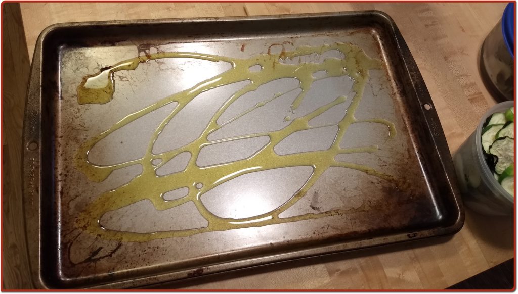 Coat cookie sheet with olive oil